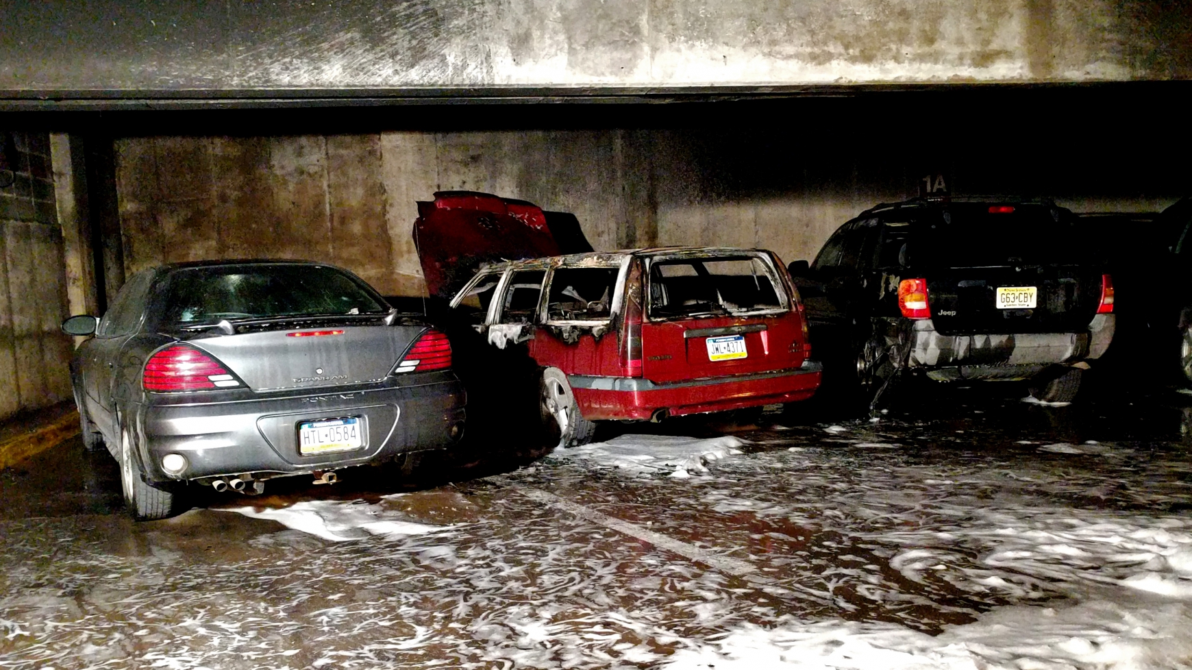 Fire Engulfs Car Parked In Pugh Street Garage